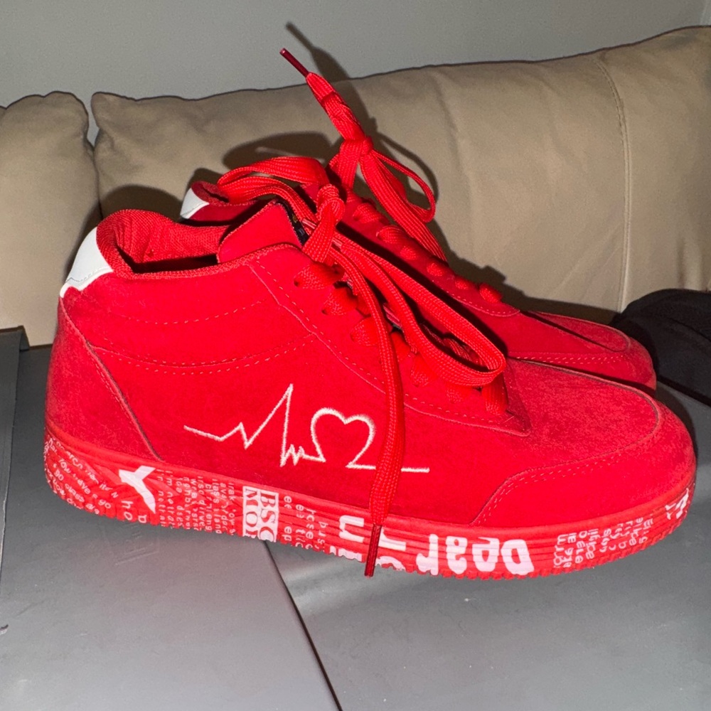 Women’s size 40 Red Sneakers with Heartbeat Design